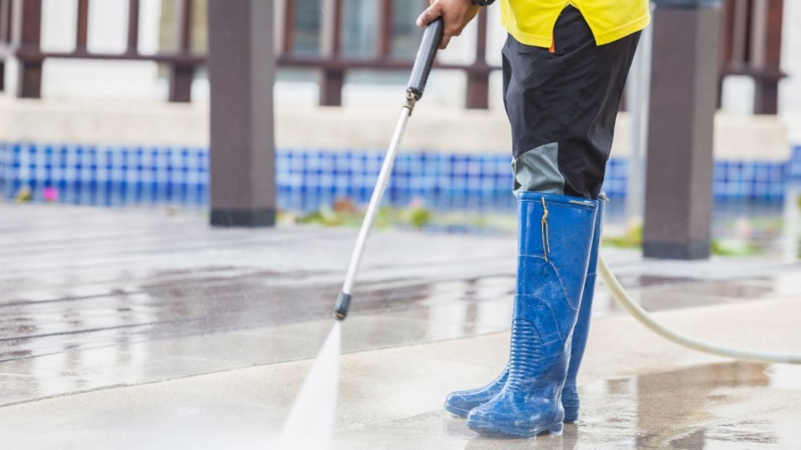 A jet cleaning service in action, clearing a blocked drainage system with high-pressure water jets